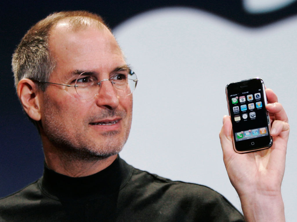 Steve Jobs Holding an iPhone
