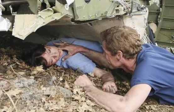 Lexie and Mark at the scene of the plane crash