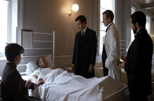 The Knick doctors speak with a patient