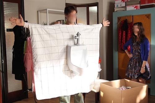 Morgan as a urinal on The Mindy Project