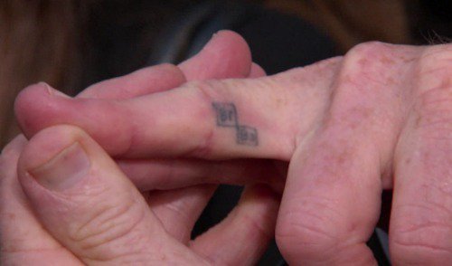 Bryan Cranston shows off his Breaking Bad tattoo